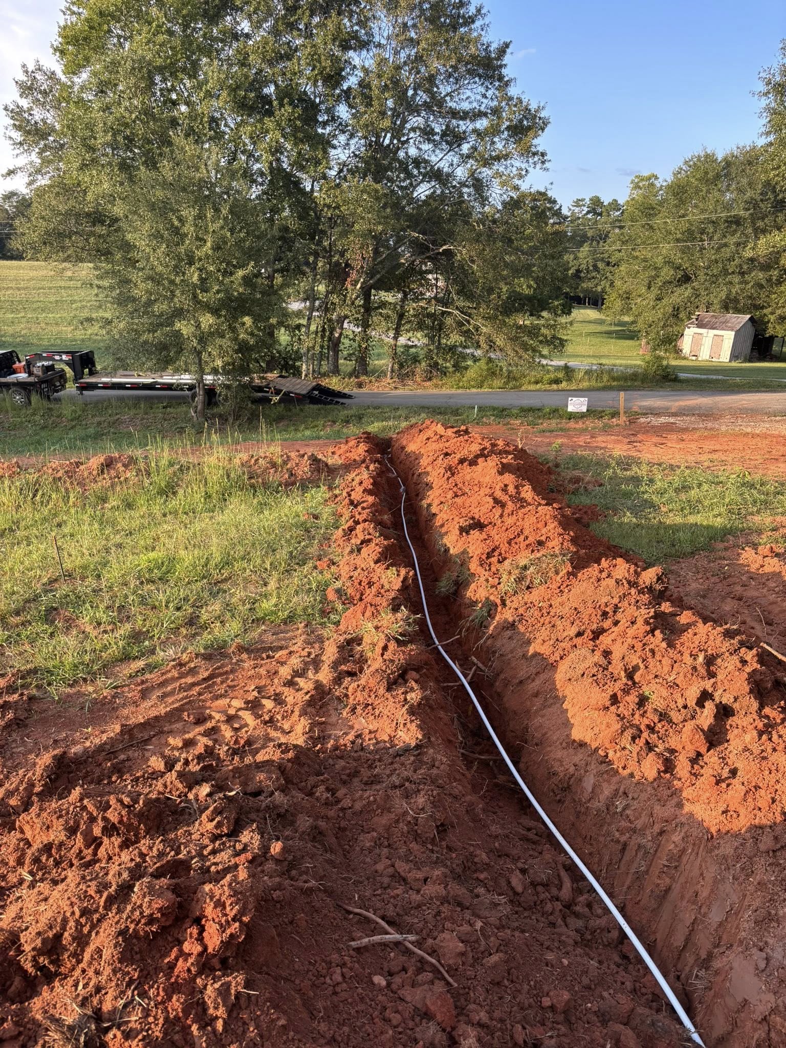 Utility line trenching